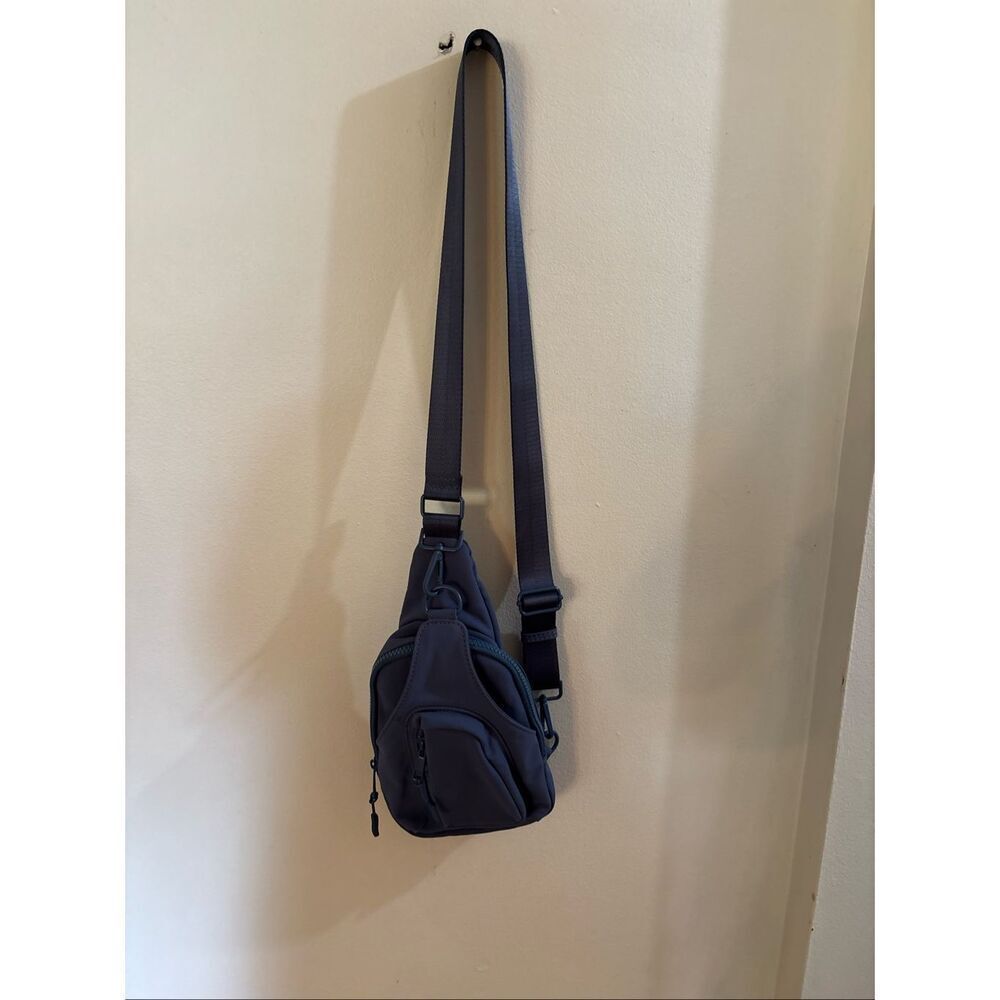 Antik Kraft sling body purse